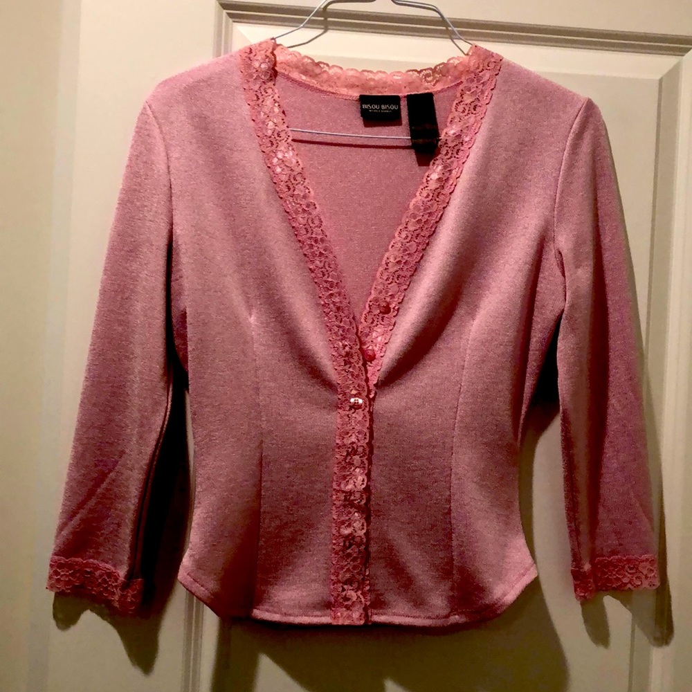 Beautiful pink blouse, you can wear for work or night out.